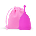 Front view of MomDaughts' Long Tail Menstrual Cup in pink color with cotton bag