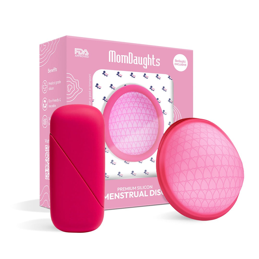 Pink menstrual disc with packaging labeled 'MomDaughts' on a white background
